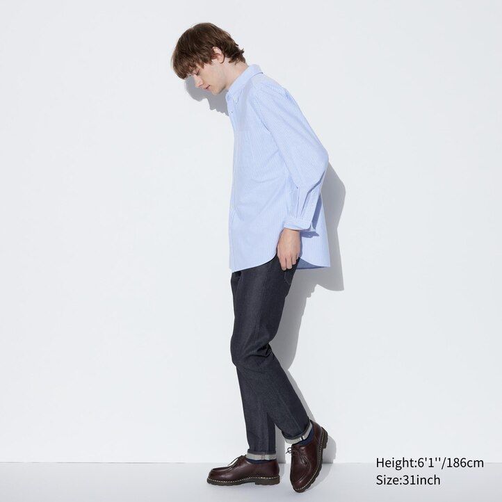 vaqueros ajustados elásticos con orillo de uniqlo para hombre color negro
