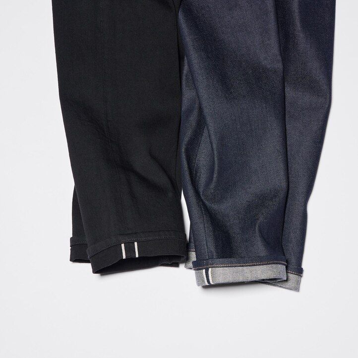 vaqueros ajustados elásticos con orillo de uniqlo para hombre color negro