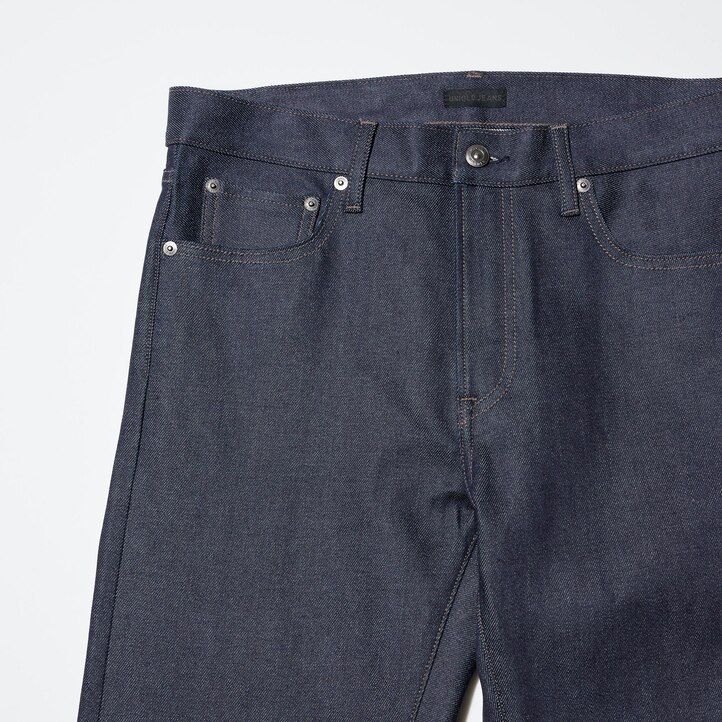 vaqueros ajustados elásticos con orillo de uniqlo para hombre color negro