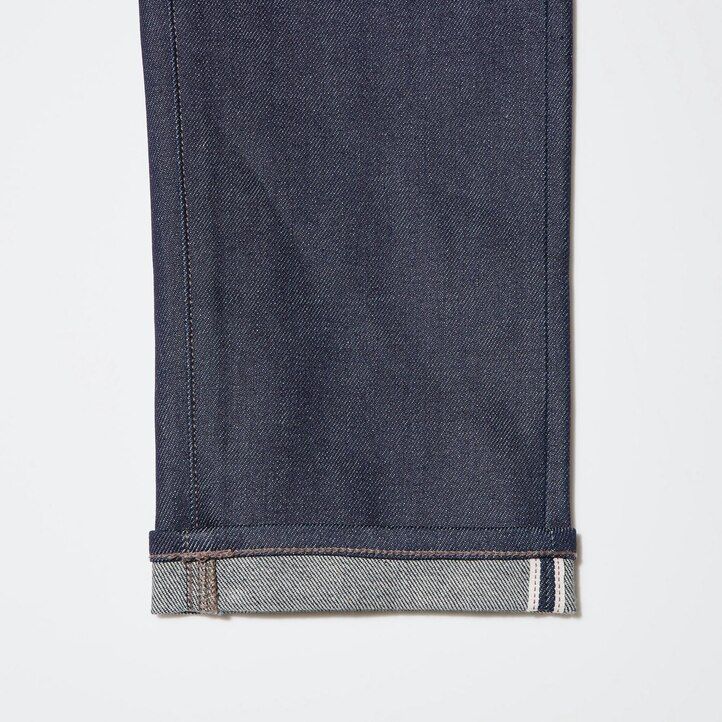 vaqueros ajustados elásticos con orillo de uniqlo para hombre color negro