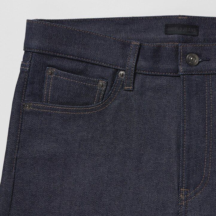vaqueros ajustados elásticos con orillo uniqlo para hombre color negro