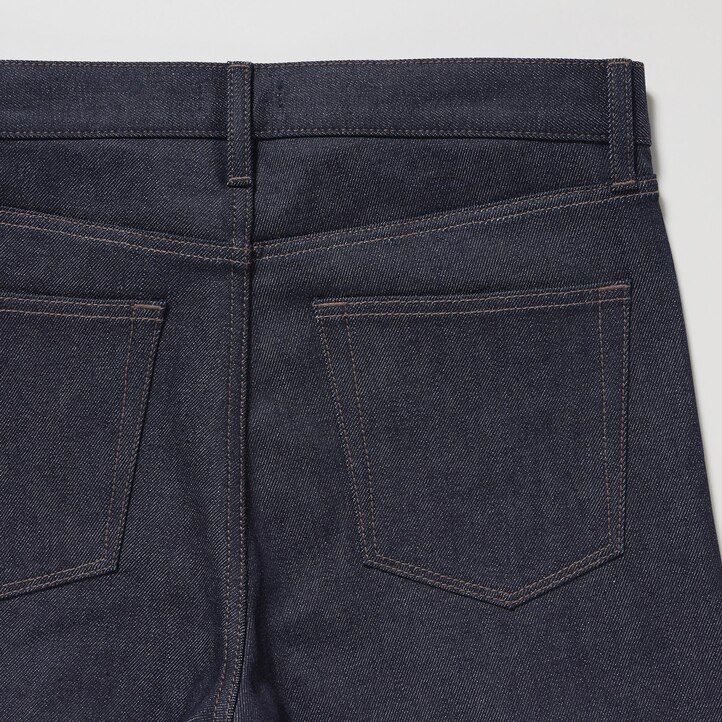 vaqueros ajustados elásticos con orillo uniqlo para hombre color negro