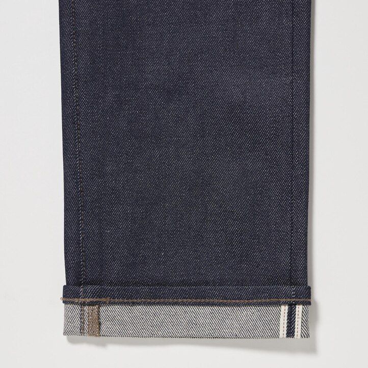 vaqueros ajustados elásticos con orillo uniqlo para hombre color negro