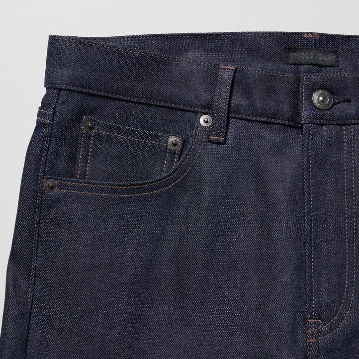 vaqueros ajustados elásticos con orillo uniqlo negros para hombre