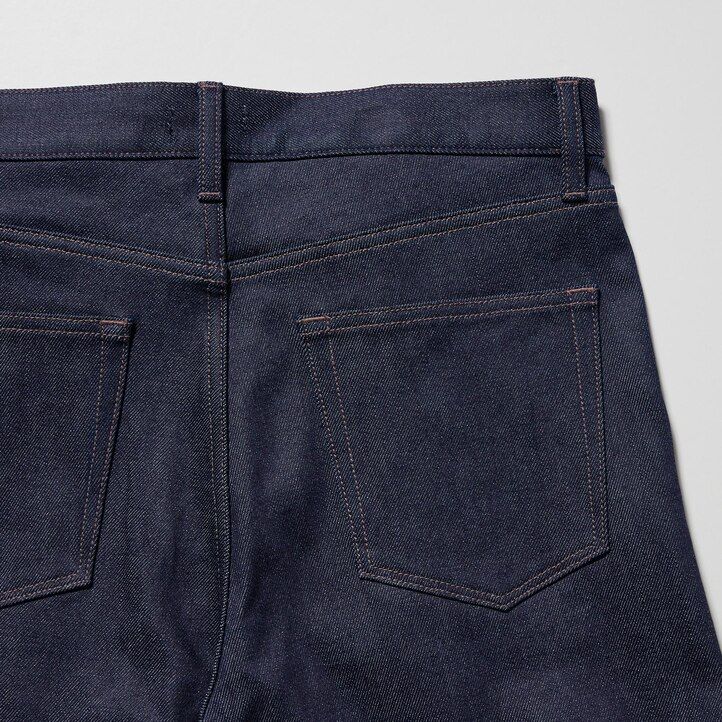 vaqueros ajustados elásticos con orillo uniqlo negros para hombre