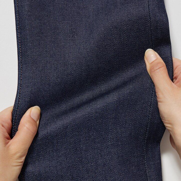 vaqueros ajustados elásticos con orillo uniqlo negros para hombre