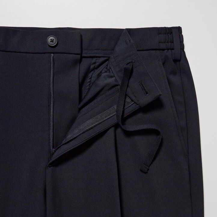 pantalones uniqlo de corte cónico plisados y elásticos bidireccionales para hombre color beige