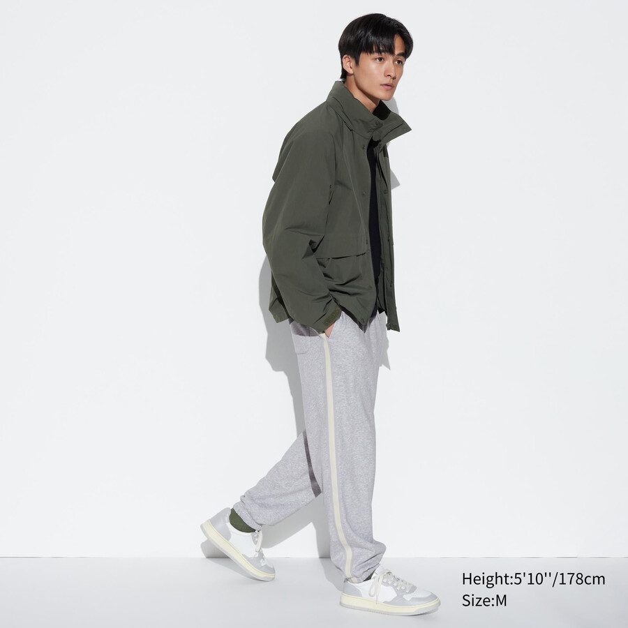 pantalones de hombre uniqlo con rayas laterales en gris
