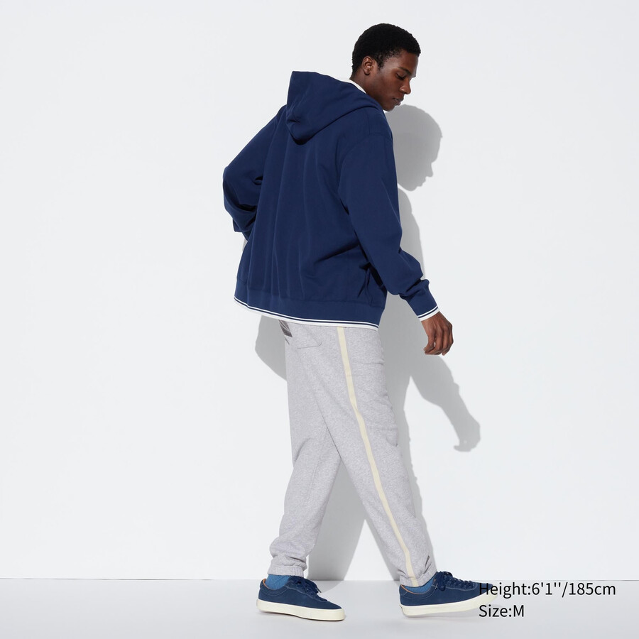 pantalones de hombre uniqlo con rayas laterales en gris