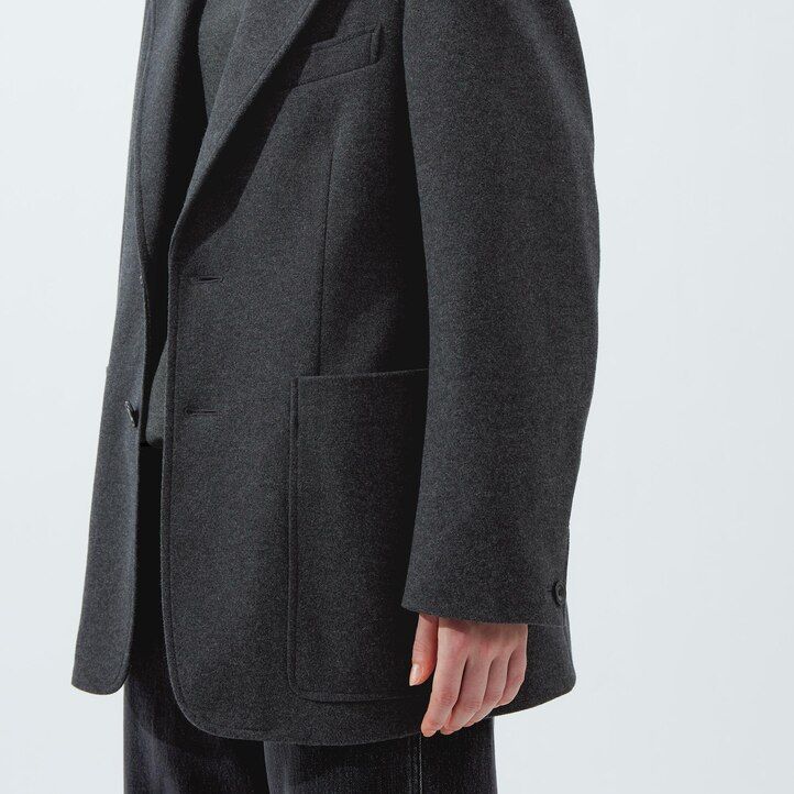 chaquetas de punto uniqlo en marrón oscuro para mujer