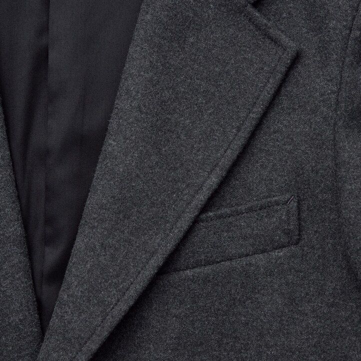 chaquetas de punto uniqlo en marrón oscuro para mujer