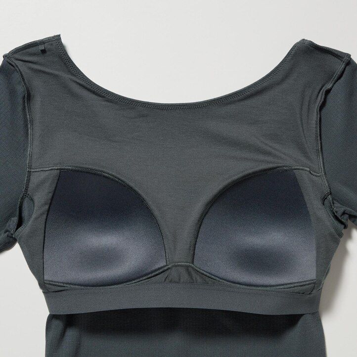 camiseta térmica uniqlo heattech verde oscuro con cuello redondo y mangas acanaladas para mujer