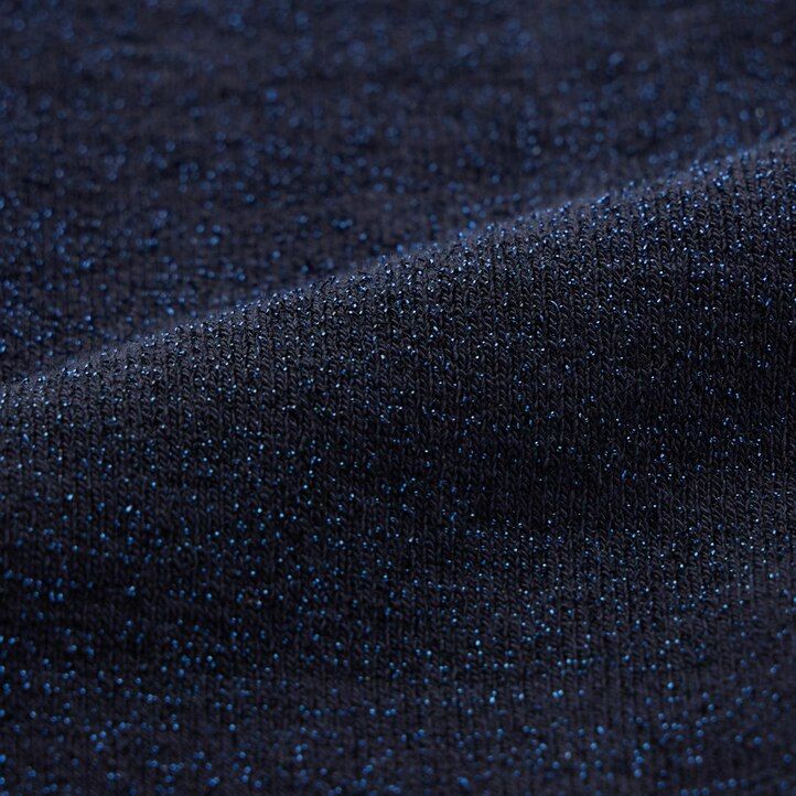 mallas térmicas de punto con purpurina heattech de uniqlo para mujer color negro